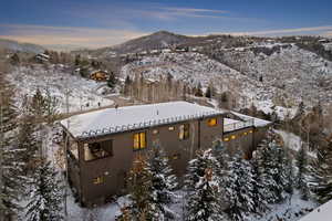 Snowy aerial view with a mountain view