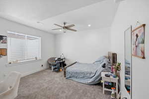 Bedroom featuring carpet and a ceiling fan