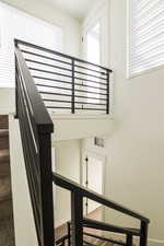 Stairs with carpet and baseboards