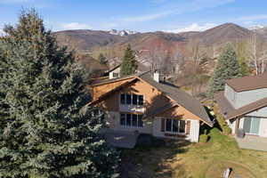 View from above of property with a mountainous background