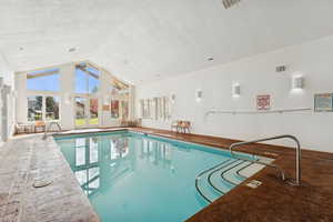 Indoor pool with a sunroom