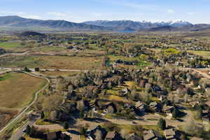 Aerial perspective of suburban area with a mountain backdrop