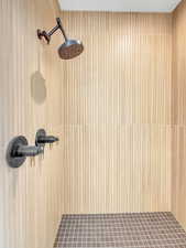 Bathroom view of a tile shower