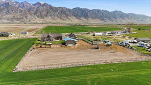 Aerial view of sparsely populated area with a mountainous background