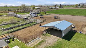 View of rural area featuring extensive farmland and a mountainous background