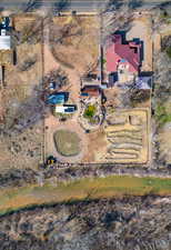 Aerial view of property and surrounding area with rural landscape