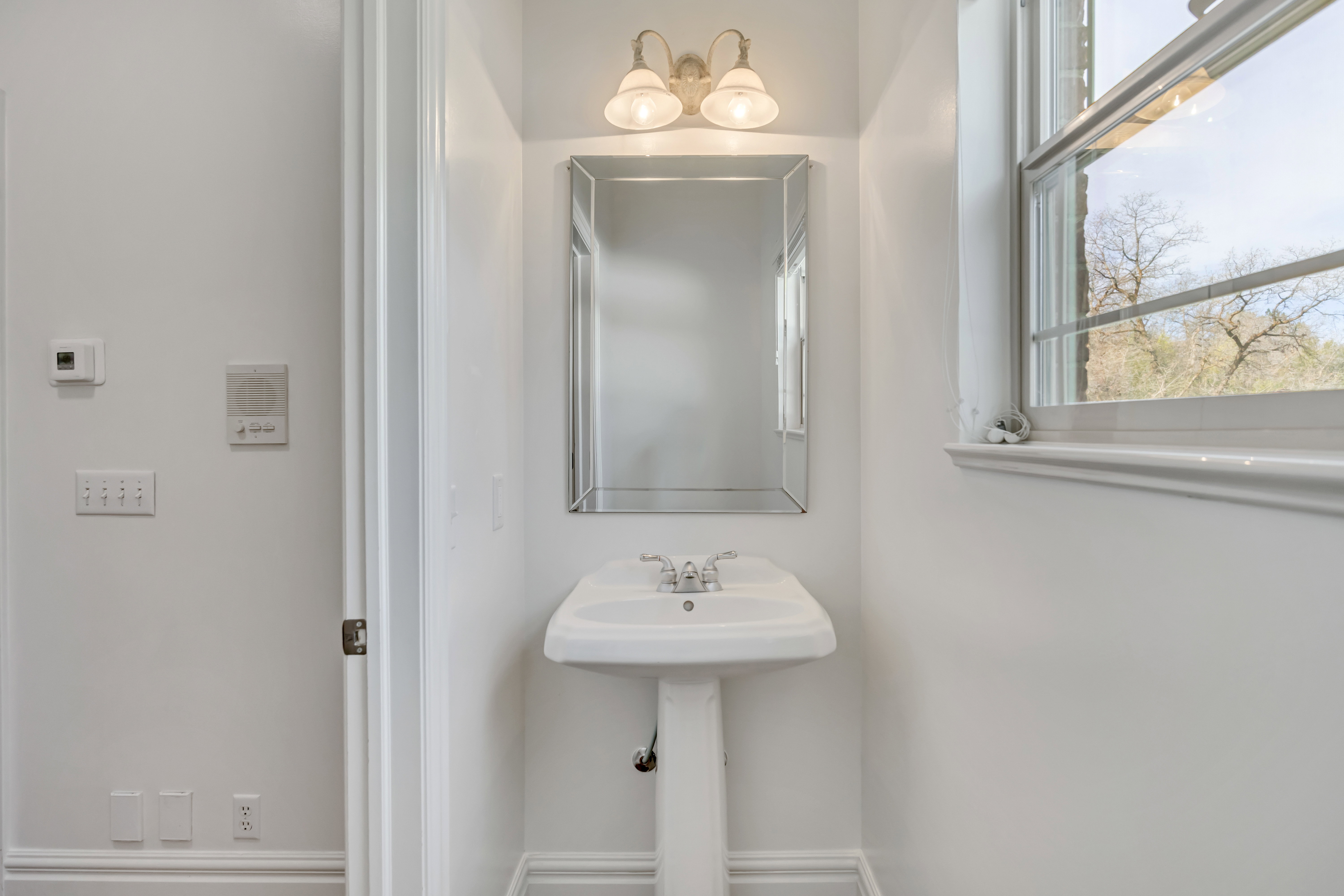 Bathroom featuring baseboards