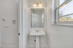 Bathroom featuring baseboards