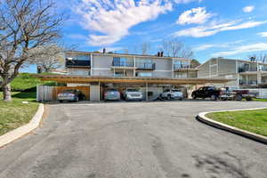 View of front of home featuring covered parking