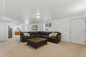 Living room with light colored carpet