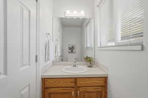 Bathroom with vanity and toilet