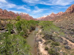 View of mountain background with a nearby body of water