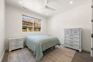 Bedroom featuring a ceiling fan and recessed lighting
