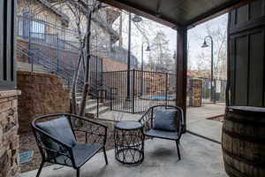 View of patio featuring stairs