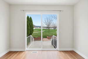 Doorway with wood finished floors