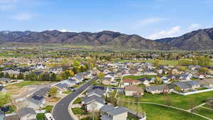 Aerial view of residential area with a mountainous background