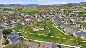 View of property location with nearby suburban area and a mountainous background