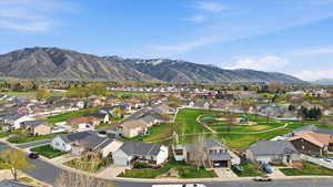 Aerial view of residential area with a mountain backdrop