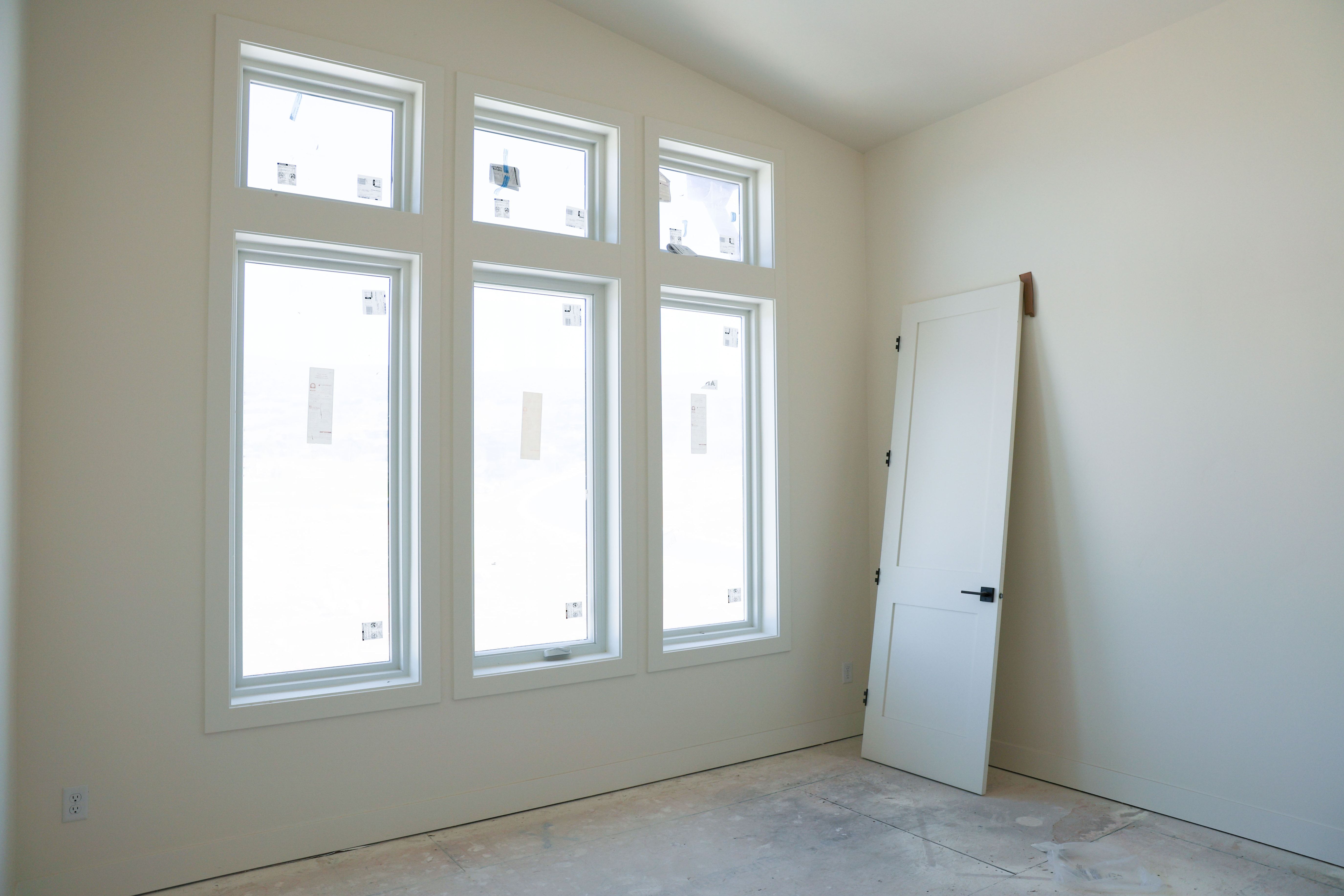 Unfurnished room featuring lofted ceiling