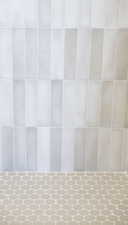 Full bath featuring a tile shower