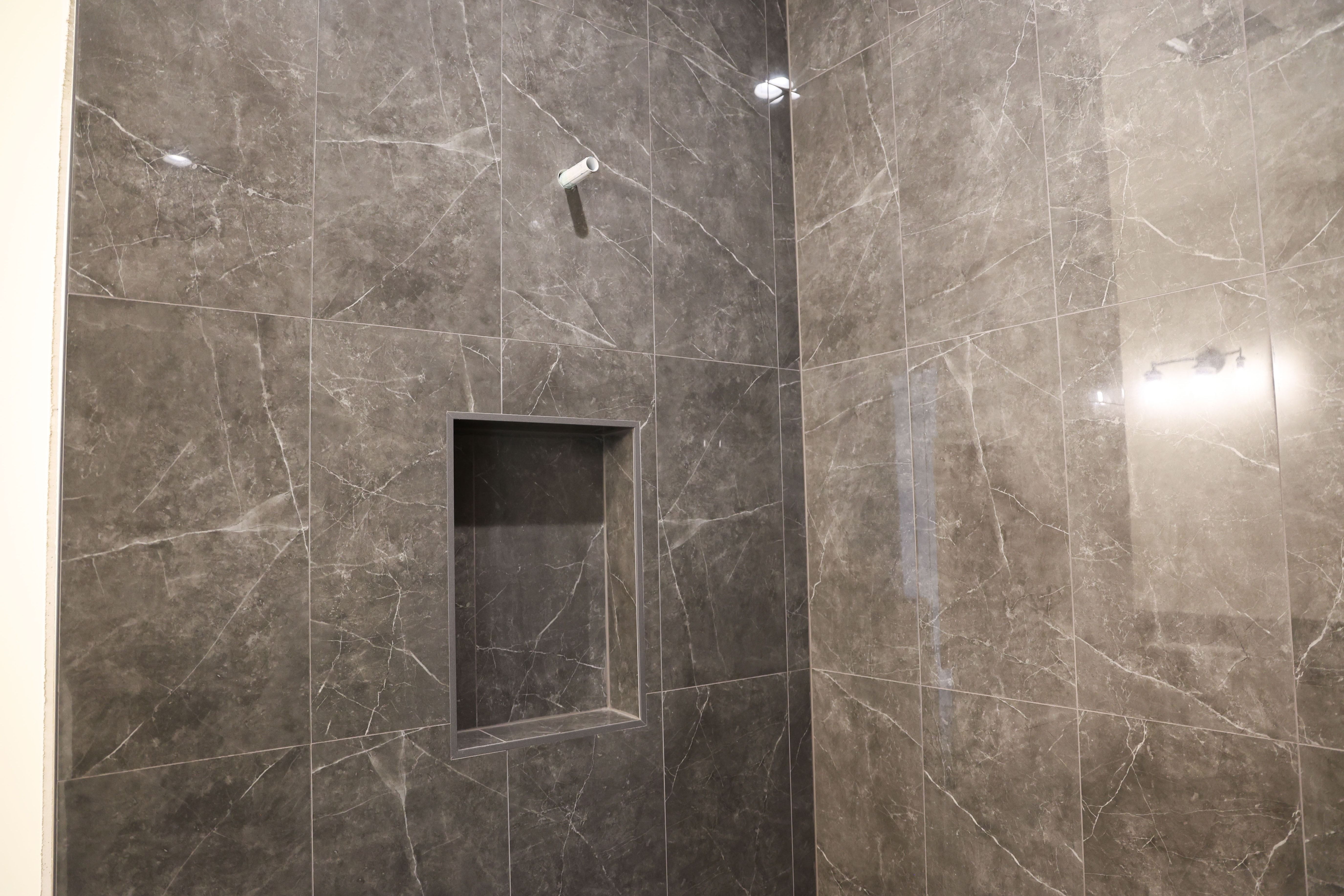 Bathroom view of tiled shower