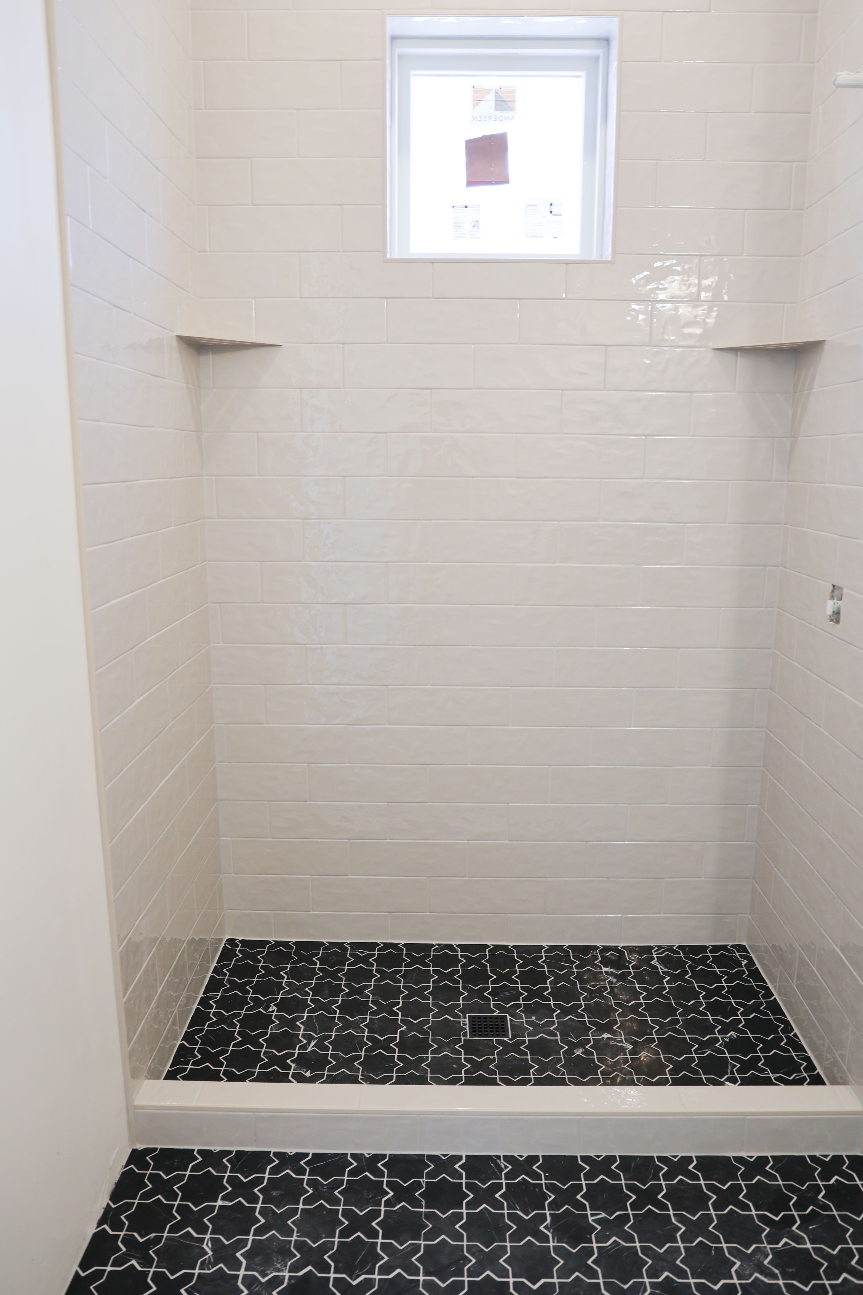 Full bath featuring a stall shower