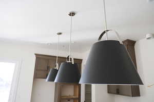 Kitchen view of hanging light fixtures