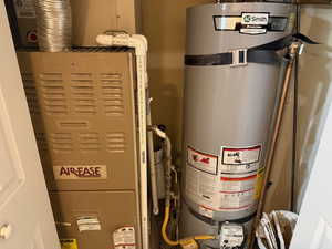 Utilities featuring strapped water heater and heating unit