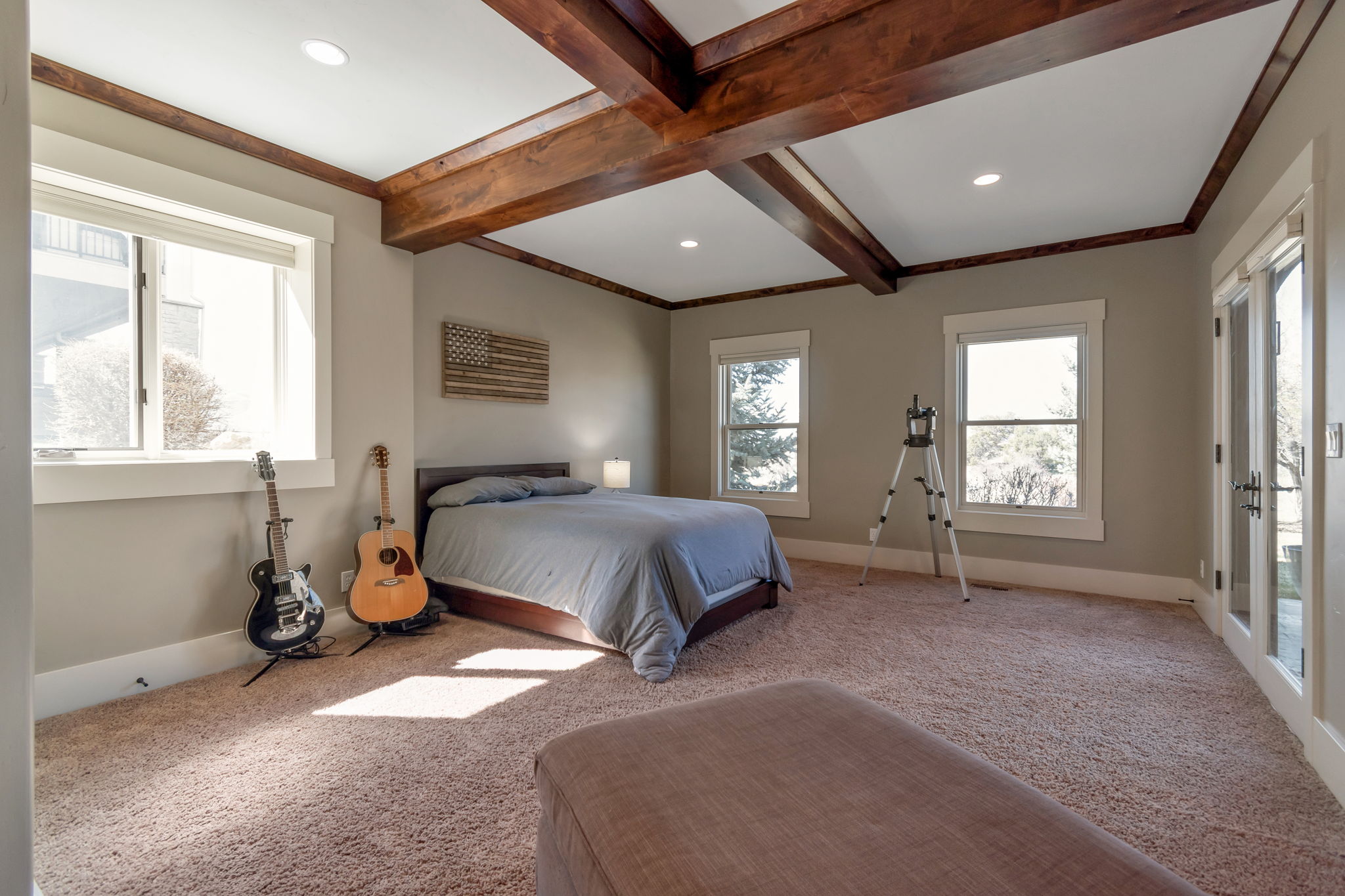 Bedroom with beamed ceiling, carpet, and recessed lighting
