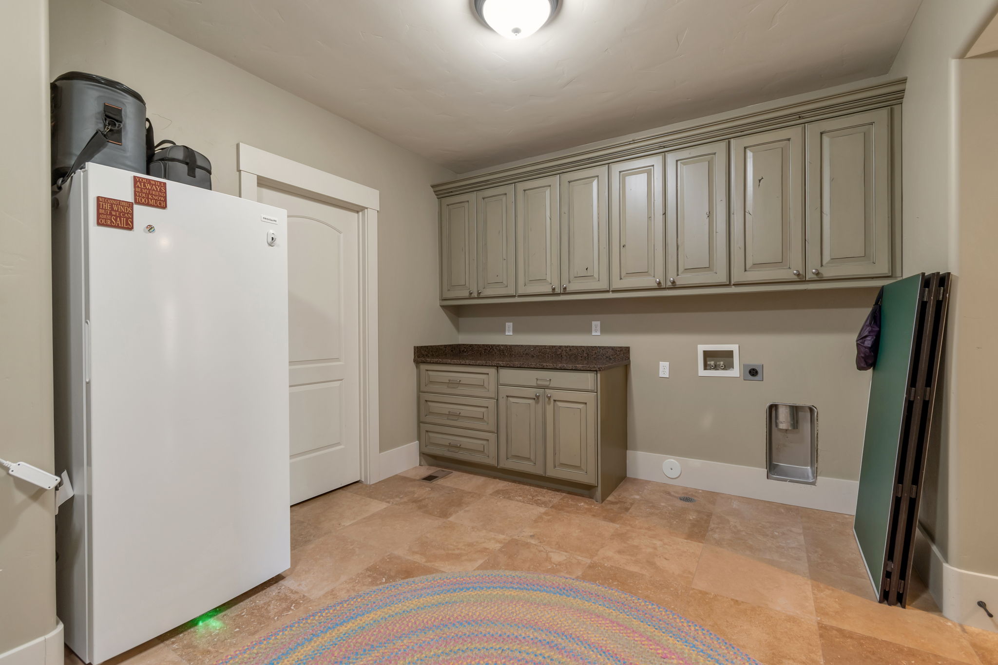 Laundry room with cabinet space, washer hookup, and electric dryer hookup