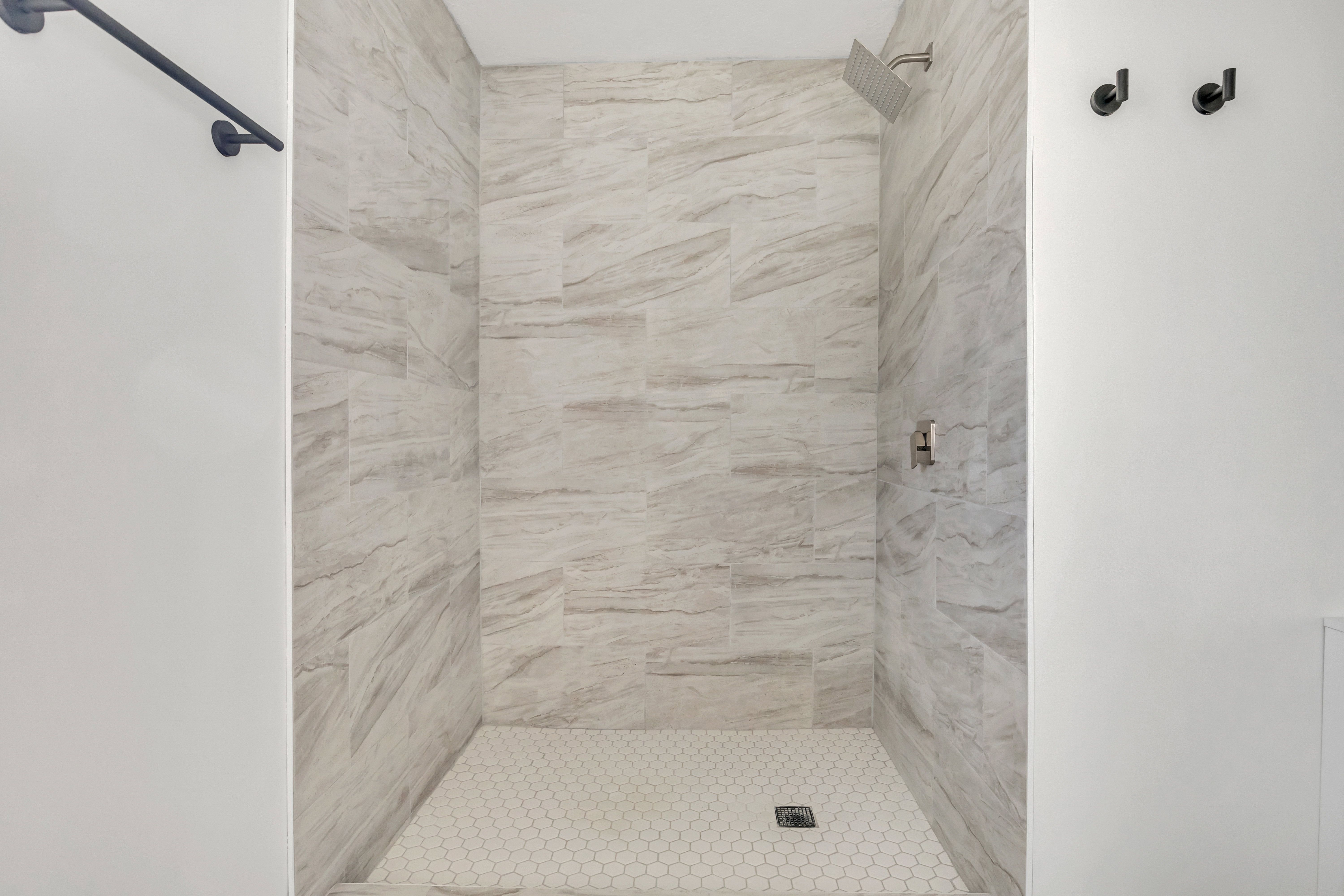 Bathroom featuring a shower stall