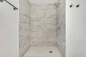 Bathroom featuring a shower stall