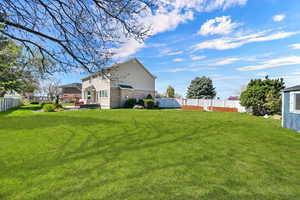 Front fence was moved back and re-sodded to expand the backyard by ~30 feet