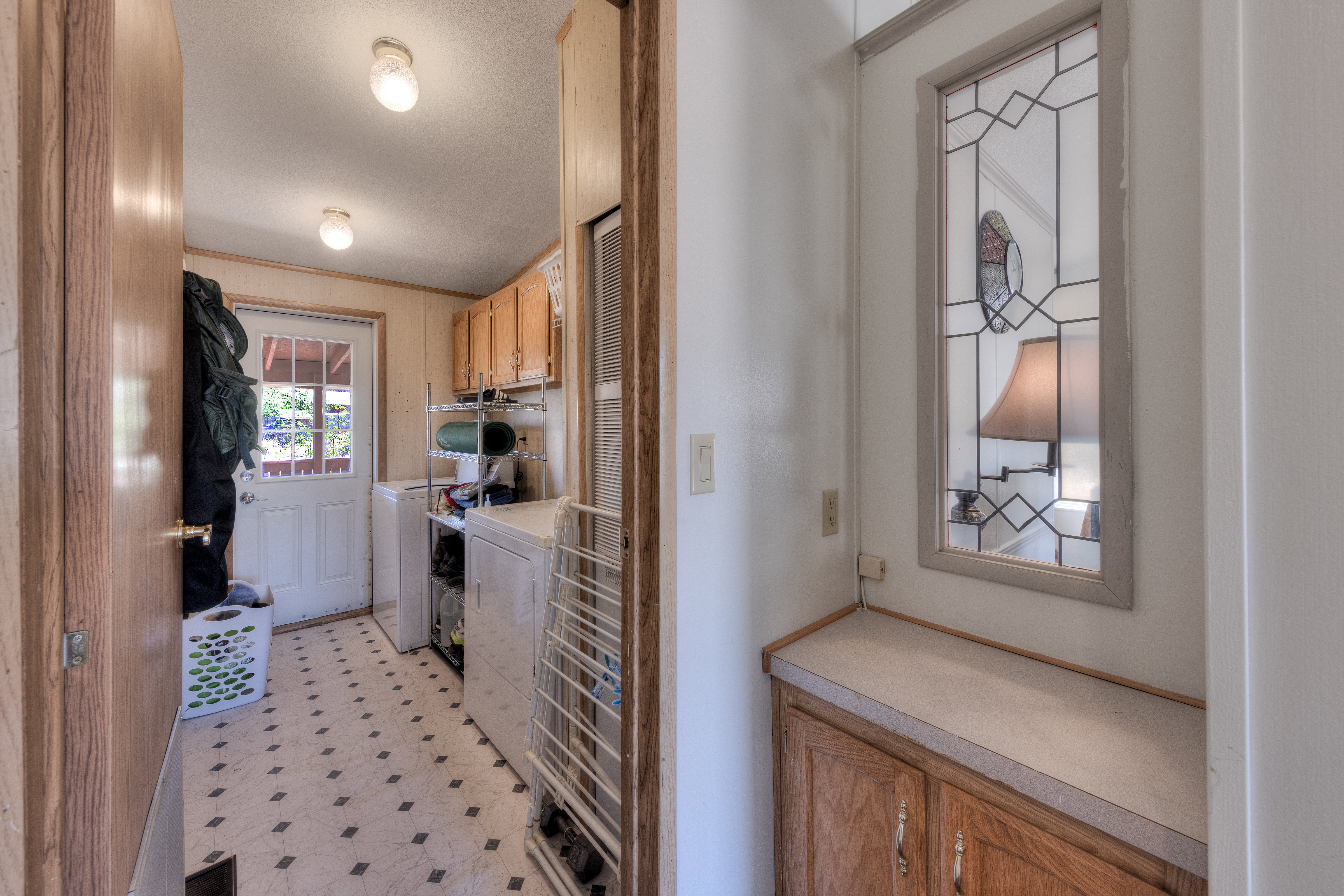 Laundry area and walk out to back deck.