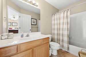Primary Suite Bathroom with Large Vanity & a Tub & Shower