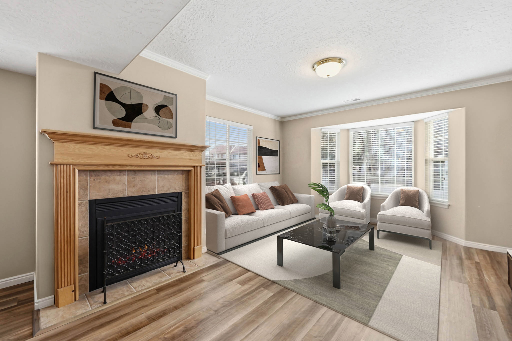 Living Room with Bay Window - Virtually staged to show possible layout of living room furniture.