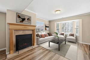 Living Room with Bay Window - Virtually staged to show possible layout of living room furniture.