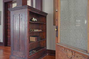 Detailed view of wood finished floors and baseboards