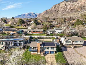 Aerial view of residential area with a mountain backdrop