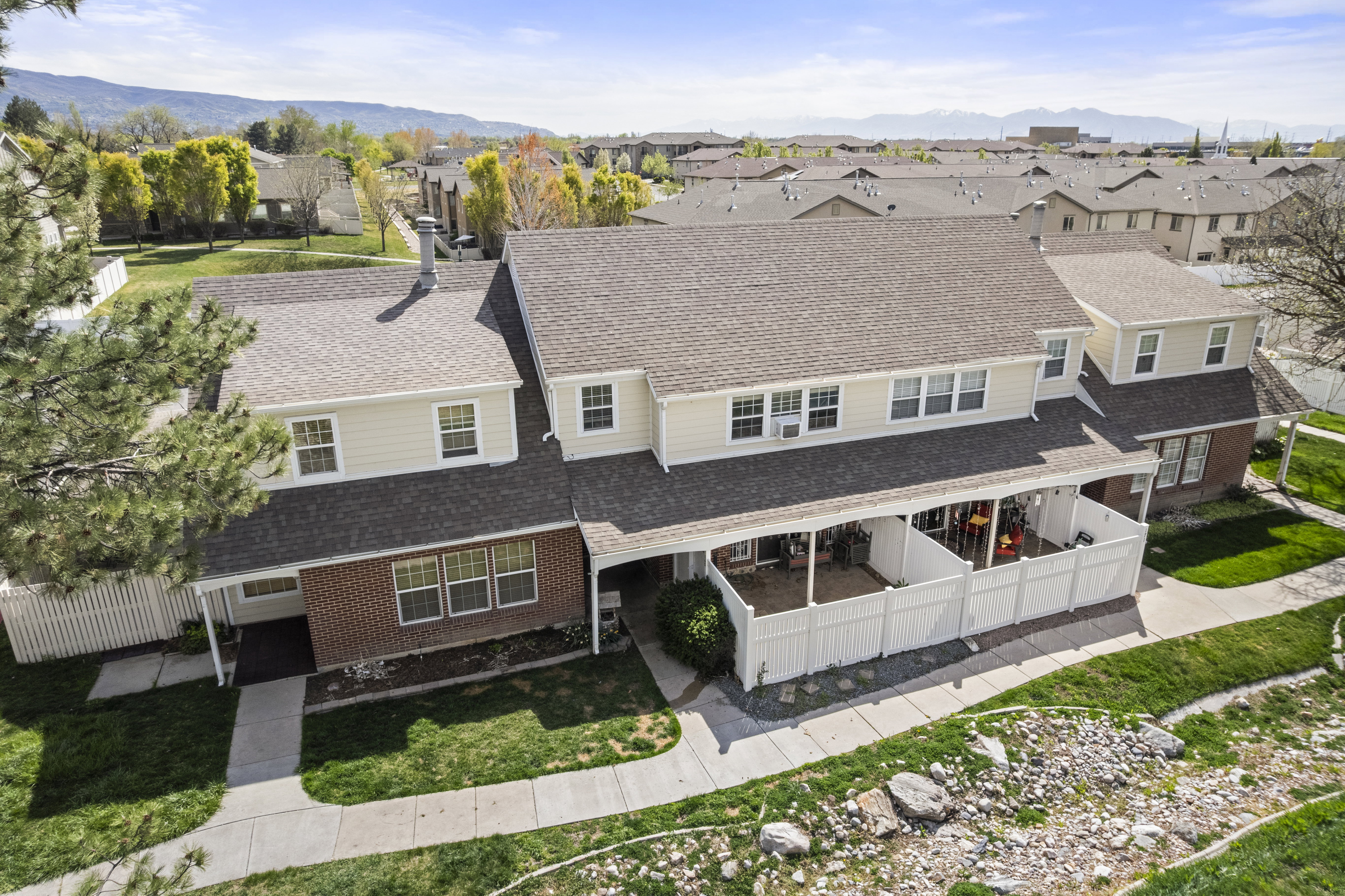 Aerial view of residential area with a mountainous background
