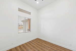 Unfurnished room with dark wood-style flooring, recessed lighting, and ceiling fan