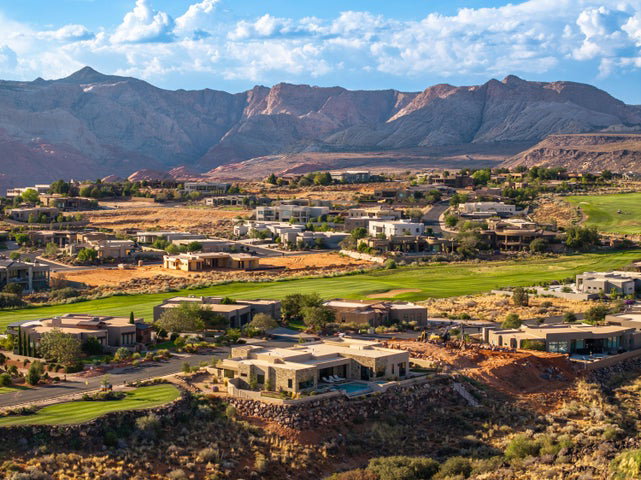 Mountain view with a golf club and nearby suburban area
