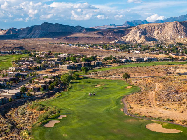 Mountain view featuring a local golf course and nearby suburban area