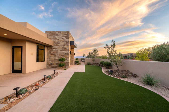 Fenced backyard featuring a patio area