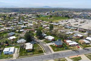 View of property location with a mountain backdrop and nearby suburban area
