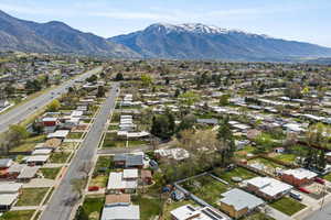Aerial view of residential area featuring mountains