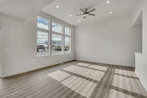 Unfurnished room featuring recessed lighting, ceiling fan, and light wood-type flooring