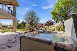 Patio / terrace featuring a patio area and a hot tub