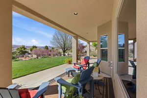 View of patio with a mountain view
