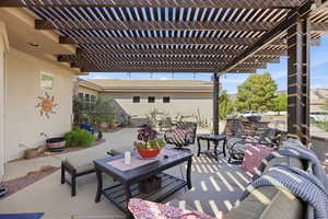 View of patio with a pergola